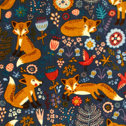 Lush Decor pixie fox on couch with child snuggling demonstrating family-friendly warmth