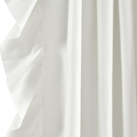 Lush Decor Reyna beside chair showing true size and graceful drape