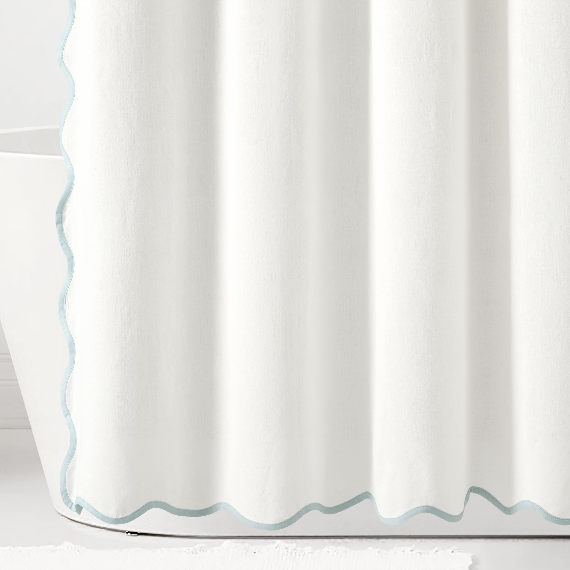Lush Decor scallop edge trim detail with blue binding adds nautical accent