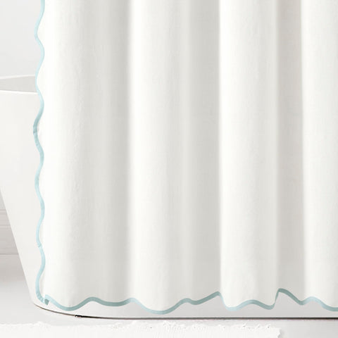 Lush Decor scallop edge trim detail with blue binding adds nautical accent