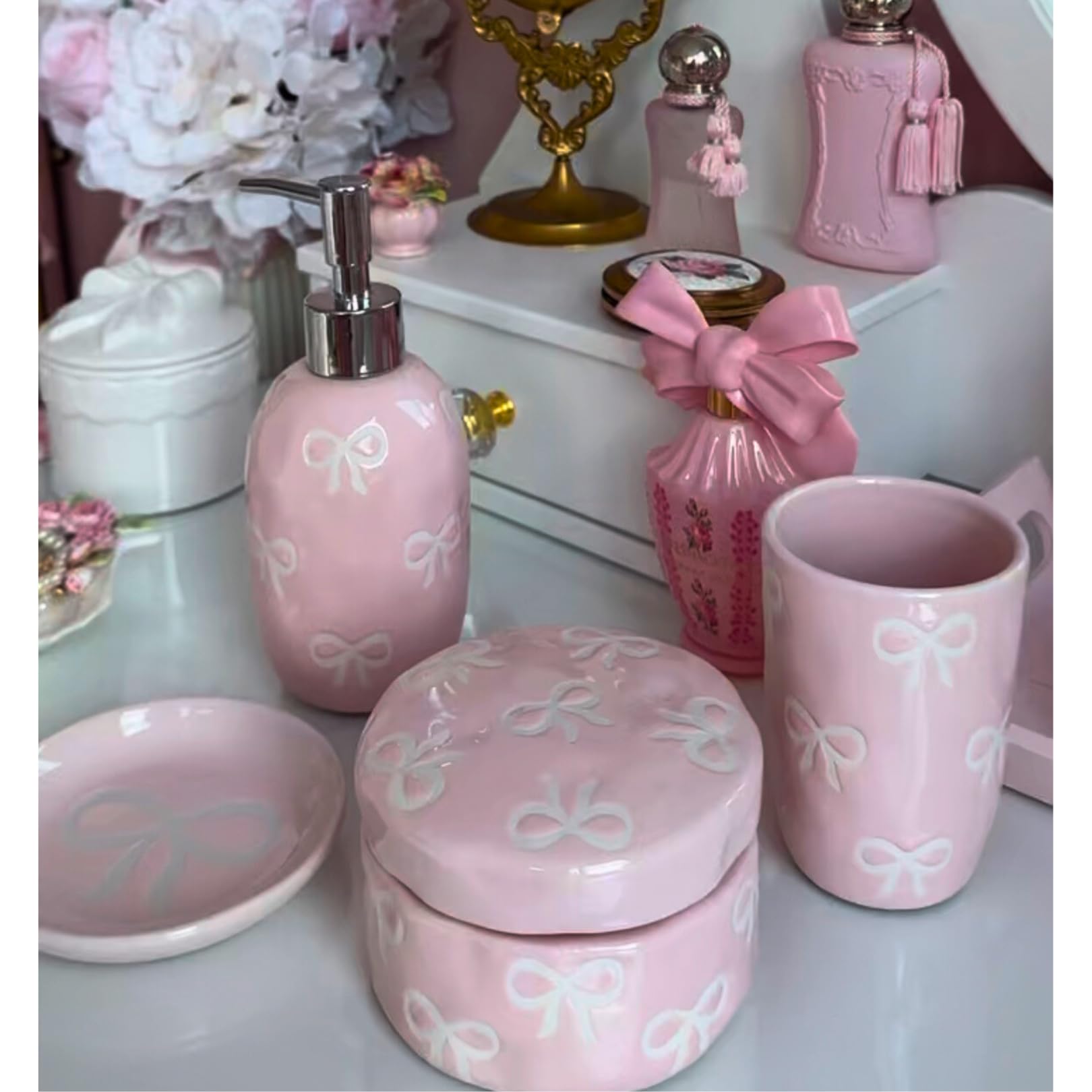 Luxape Bow set arranged in a bathroom lifestyle scene adding soft pink decor