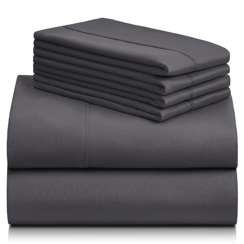 LuxClub sheet set on bed after washing showing wrinkle-free surface and retained color vibrancy