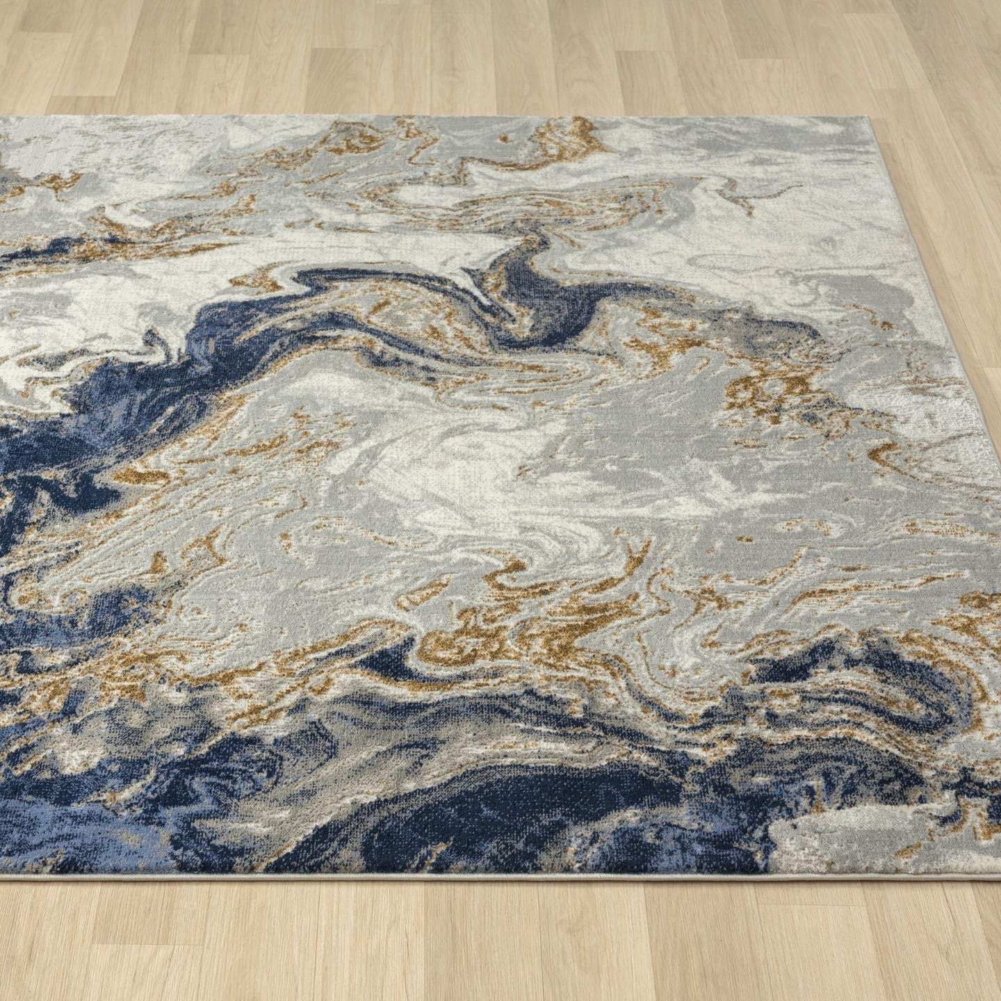 LUXE WEAVERS rug in living room under coffee table providing polished focal point