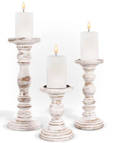 Luxe Designs front view of three-piece candle holder set adding warm ambience
