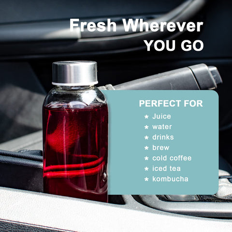 Luxfuel bottles on picnic table conveying reusable stylish outdoor hydration