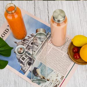 Luxfuel hand holding bottle showing 24oz scale and comfortable grip
