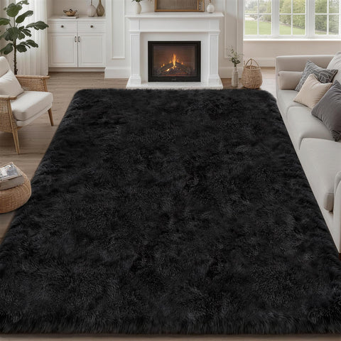 Luxturiy front view of 8x10 black rug showing plush look and anchoring benefit
