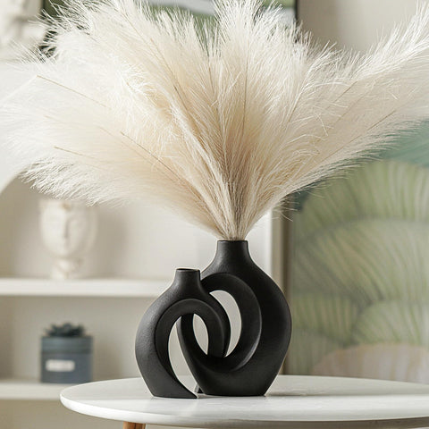 Lvases close view of shorter vase neck opening showing suitability for single stems