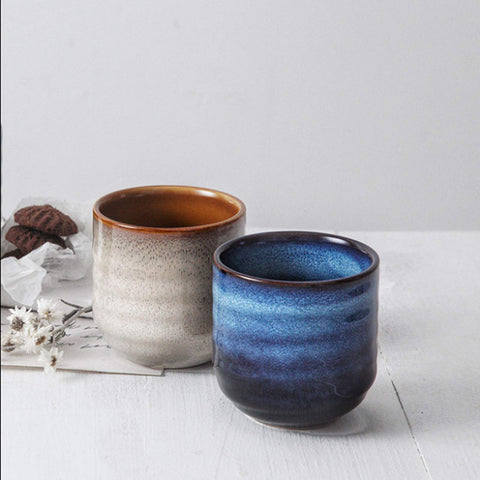 Lxuwbd cup with hot tea poured demonstrating heat retention and beverage presentation