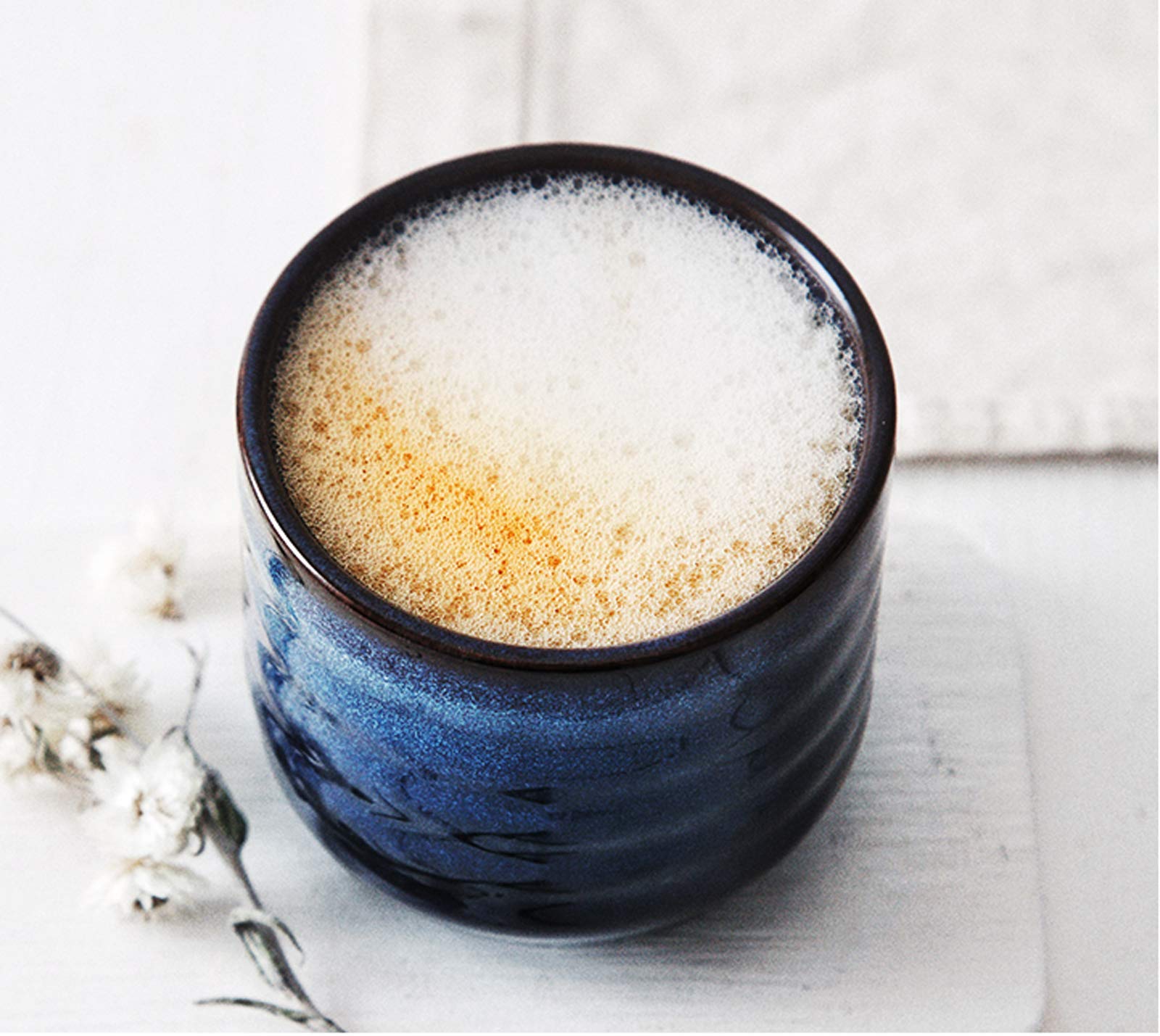 Lxuwbd cups styled on a kitchen counter conveying elegant everyday table setting