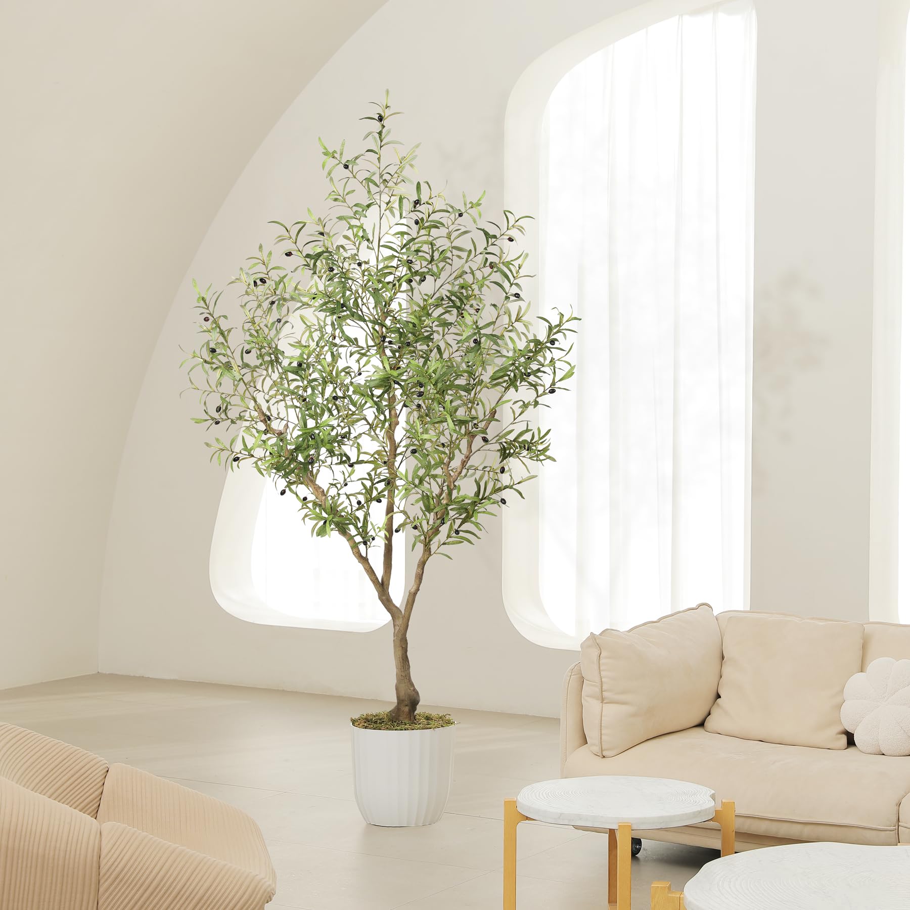 LYERSE faux olive tree styled in living room adding height and calming atmosphere benefit