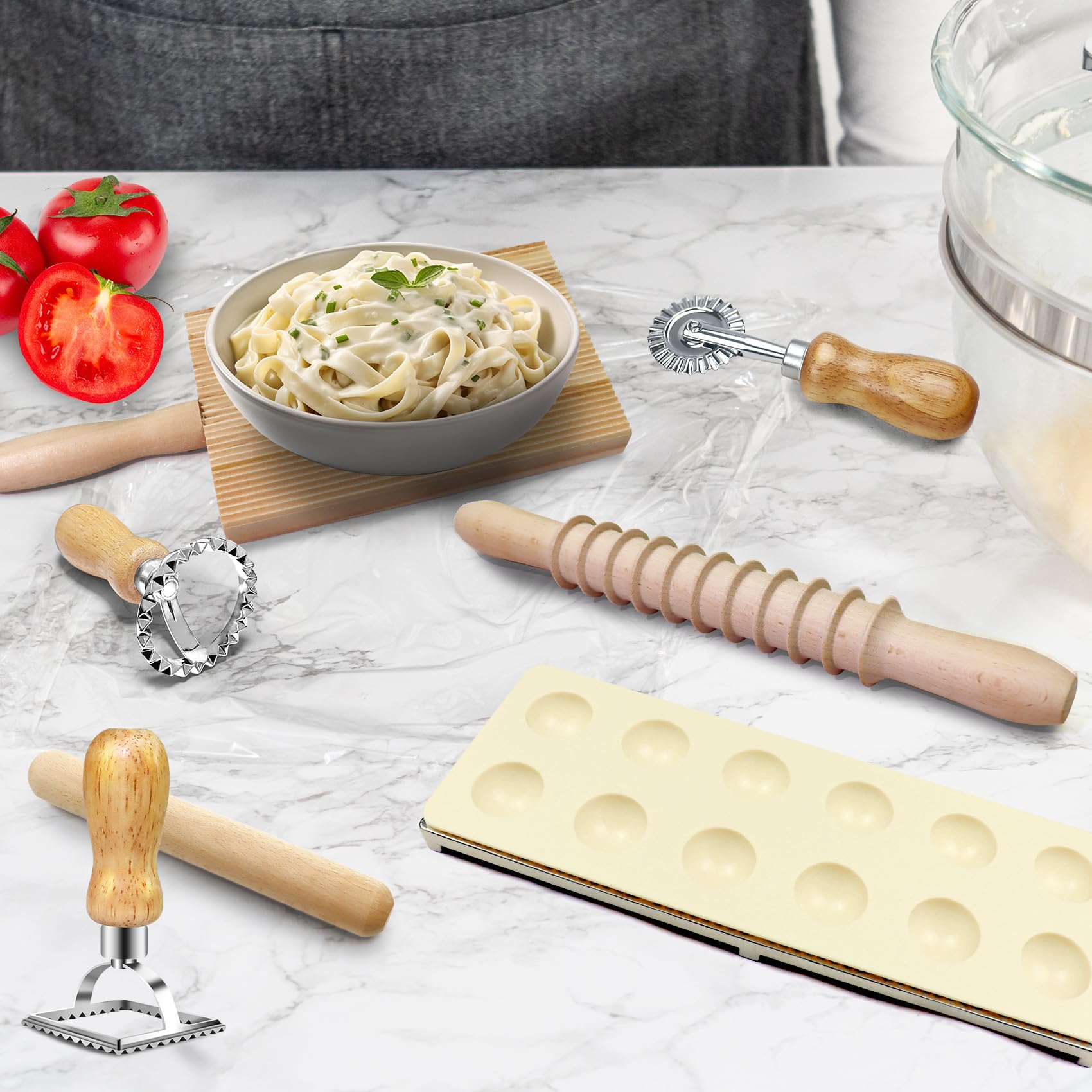 MACIFECI lifestyle image of hands using tools on a kitchen table for home pasta making
