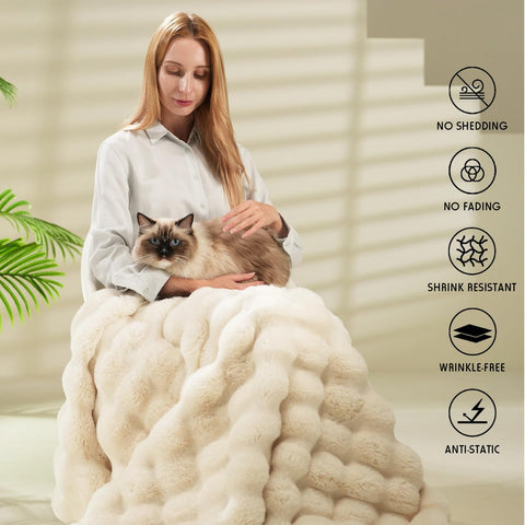 macinso person wrapped in blanket demonstrating warmth and comfort while relaxing