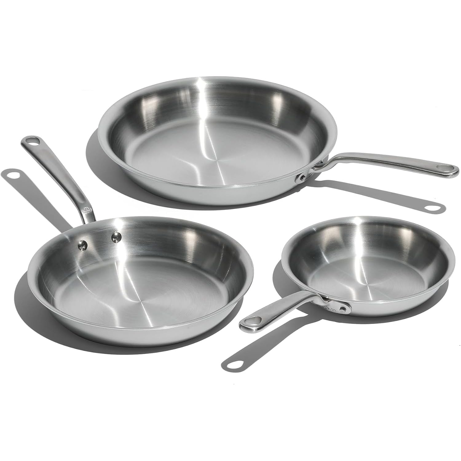 Made In frying pan set front view showing three sizes and polished finish for versatile cooking