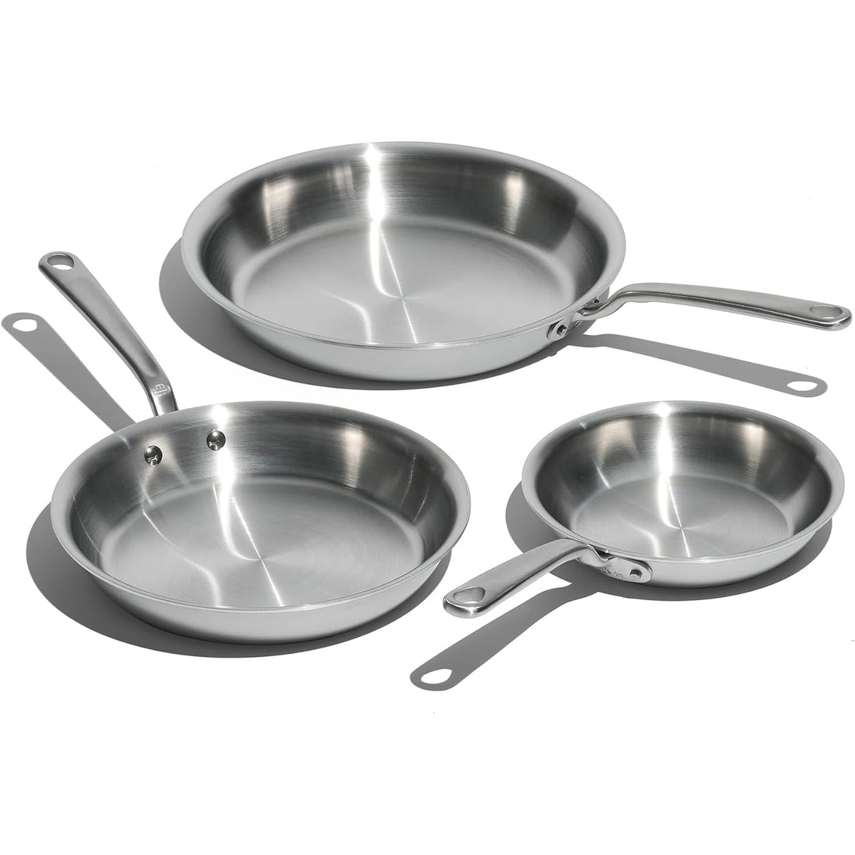 Made In frying pan set front view showing three sizes and polished finish for versatile cooking