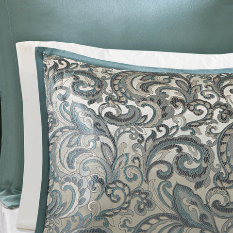 Madison Park comforter border detail showing solid teal edge for contrast