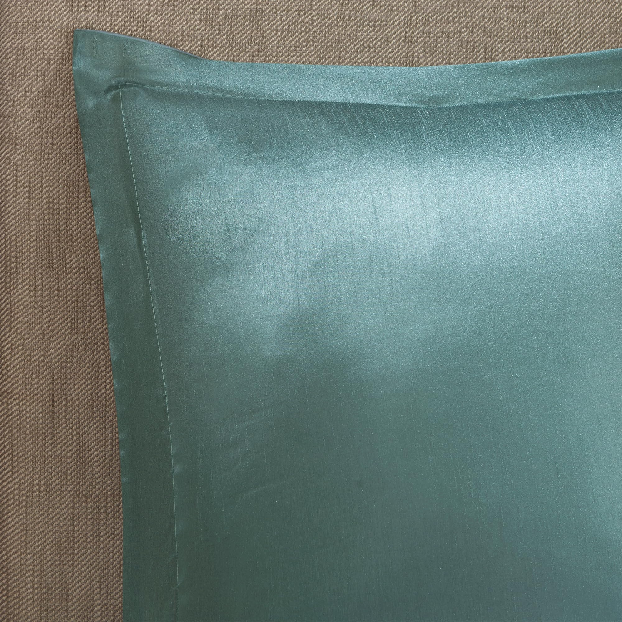 Madison Park decorative pillows grouped to show embroidery and pleating accents
