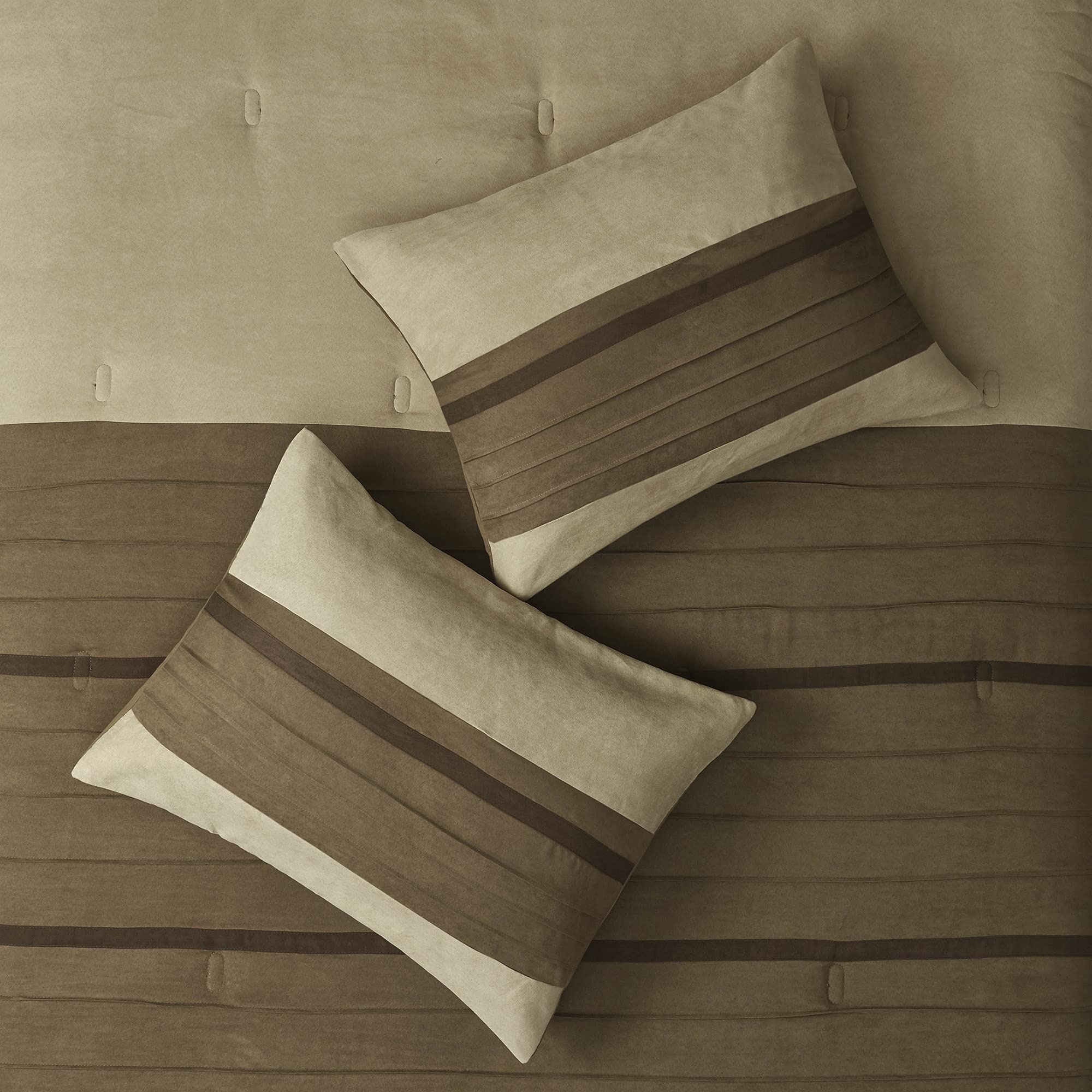 Madison Park decorative pillows styled on bed adding visual interest