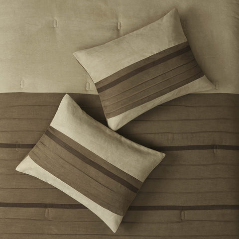 Madison Park decorative pillows styled on bed adding visual interest