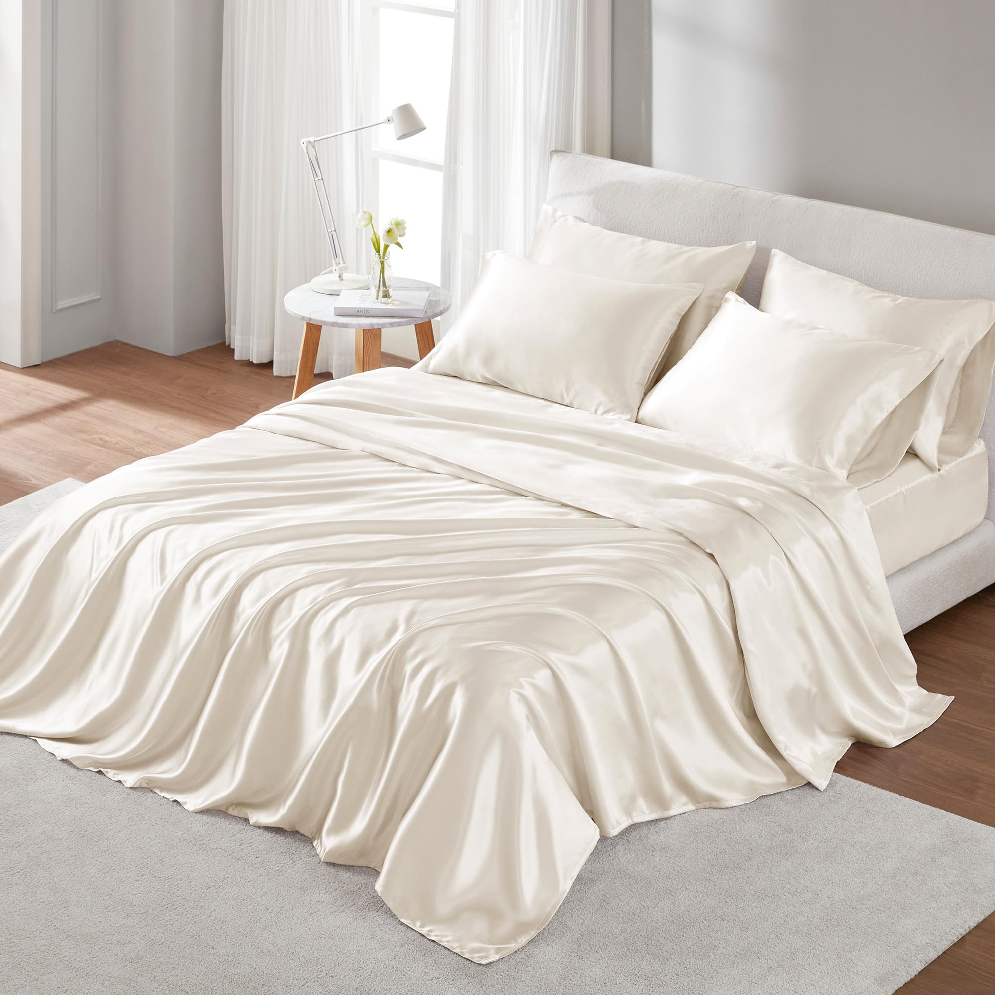Madison Park front packaging showing ivory satin set and benefits