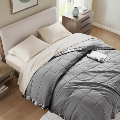 Madison Park neatly folded blanket in packaging showing easy storage and gifting