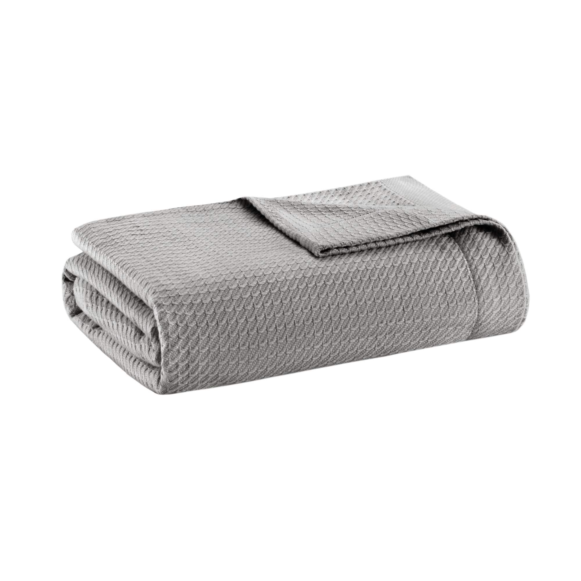 Madison Park front view of grey blanket highlighting soft finish and styling benefit