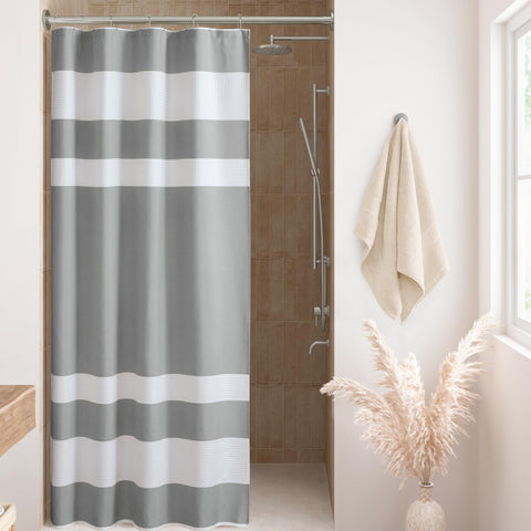 Madison Park front view of grey waffle shower curtain shows spa style and neat finish
