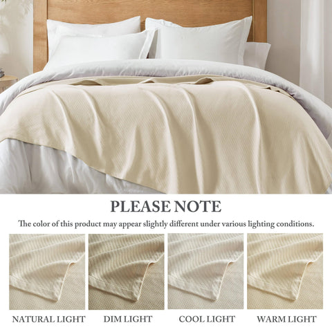Madison Park hands feeling fabric demonstrating silky tactile comfort