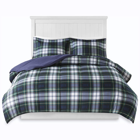 Madison Park vacuum-packed comforter being unboxed to show space-saving shipping and quick setup