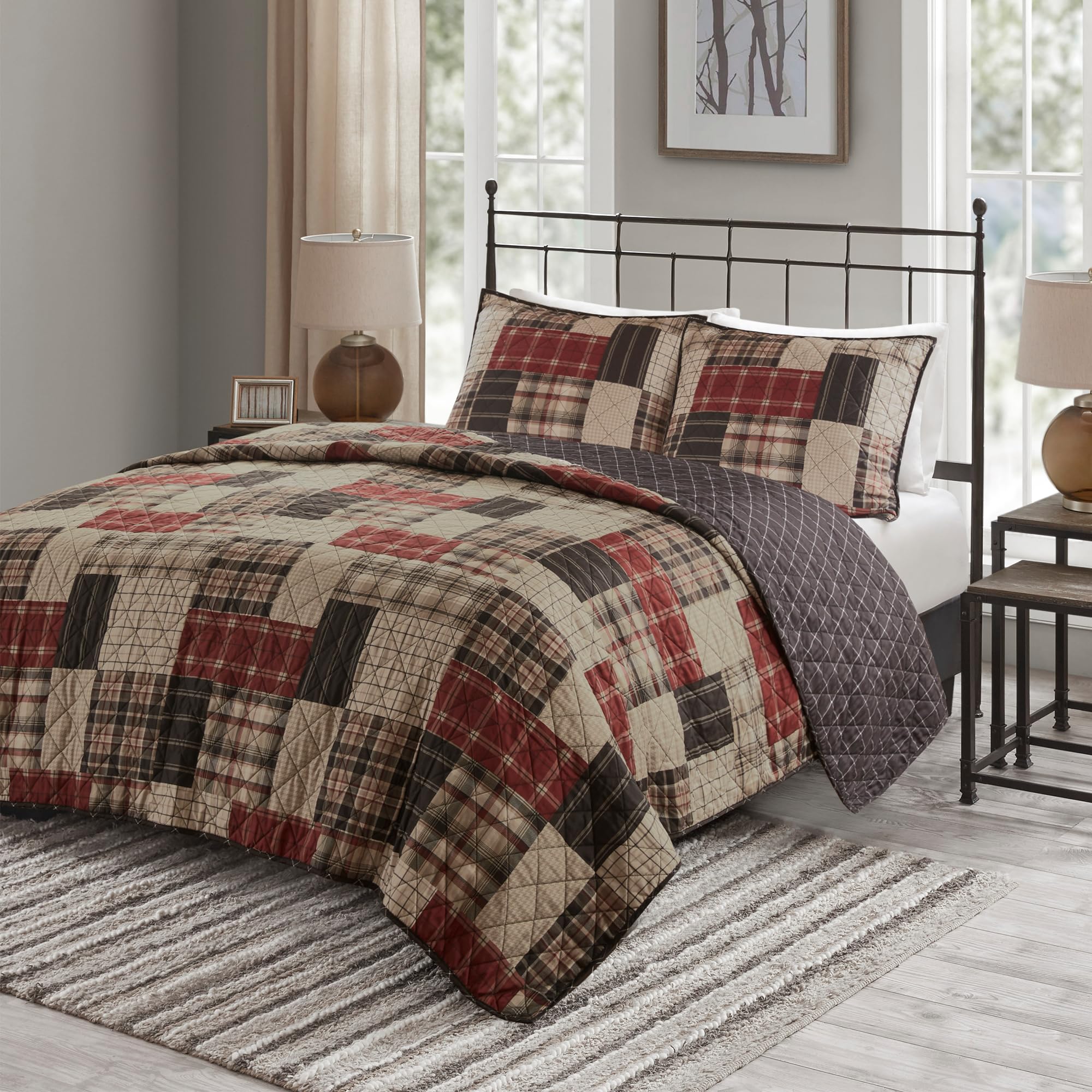 Madison Park quilt front view showing red and black patchwork and cozy appeal