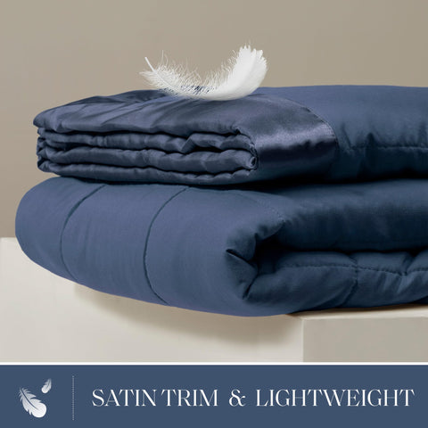 Madison Park close-up of satin trim highlighting silky edge that enhances comfort and style