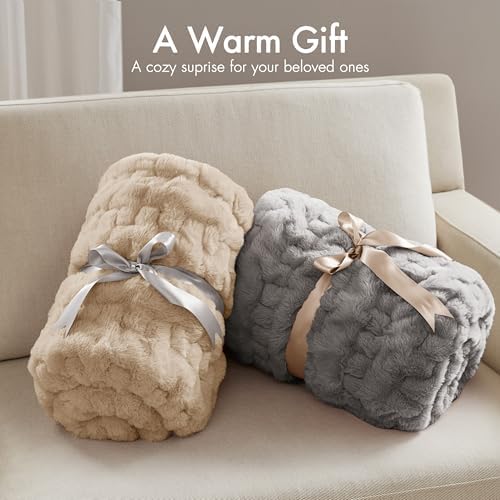 Madison Park throw draped on lap showing perfect size and warmth