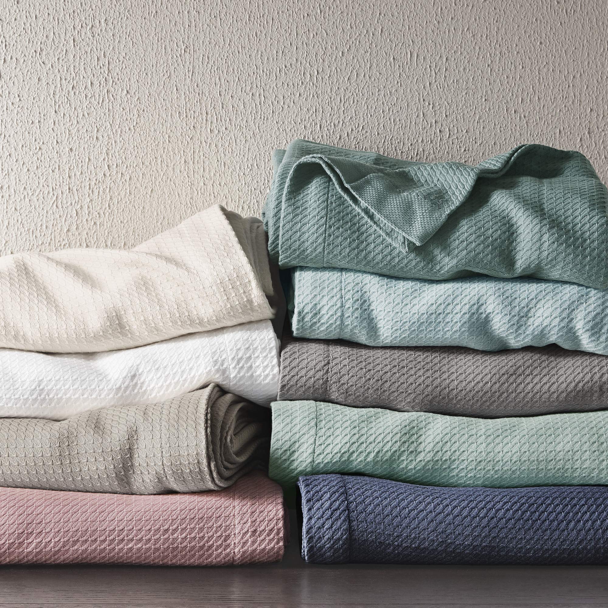 Madison Park blanket spread on bed demonstrating full/queen coverage benefit