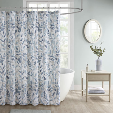 Madison Park Sofia front view showing full blue botanical curtain and clean aesthetic