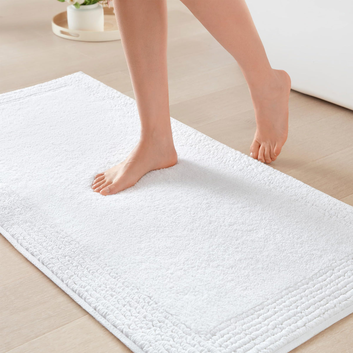 Madison Park front view of white rug showing neat edges and clean aesthetic for bathroom style