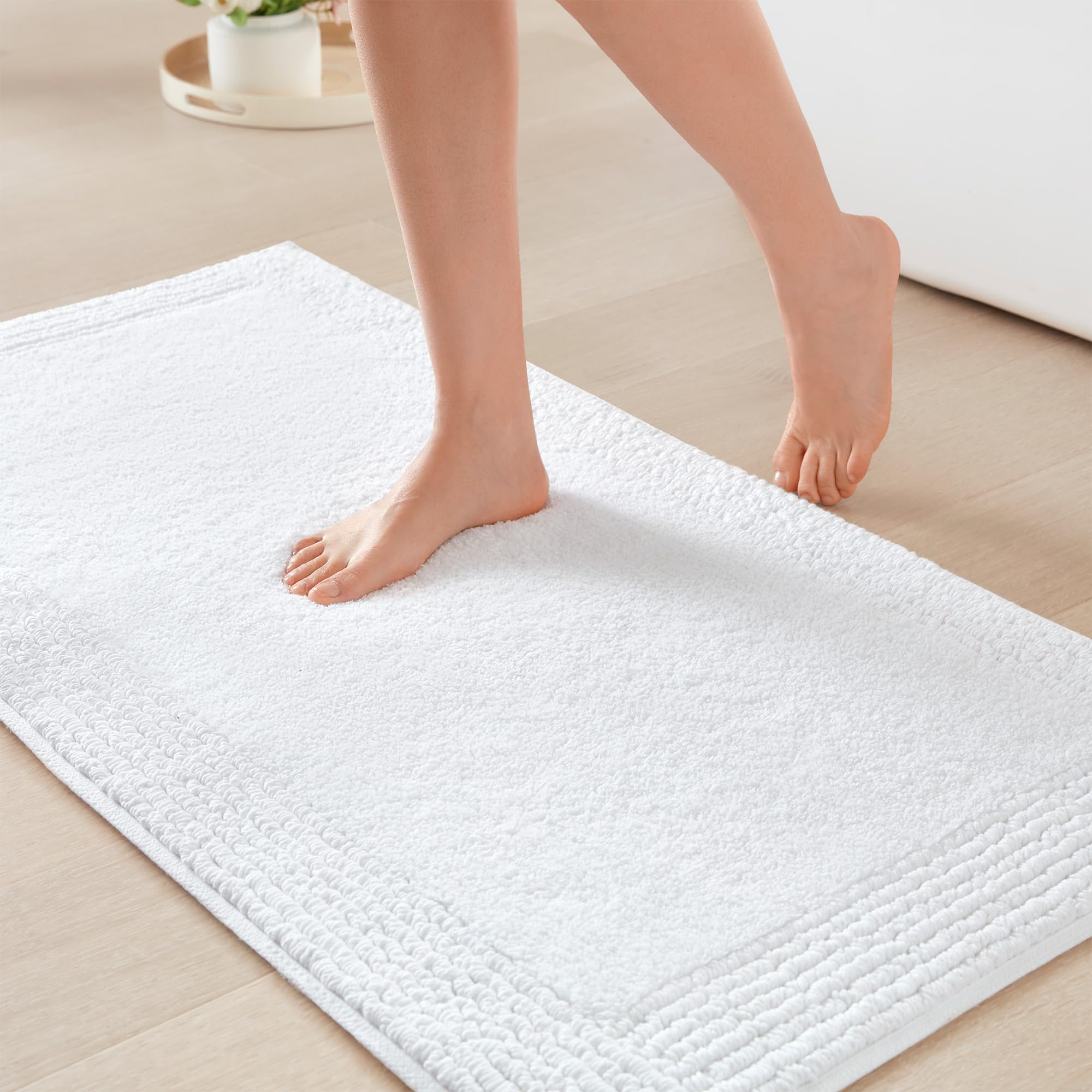 Madison Park front view of white bath rug showing plush cotton surface and clean styling