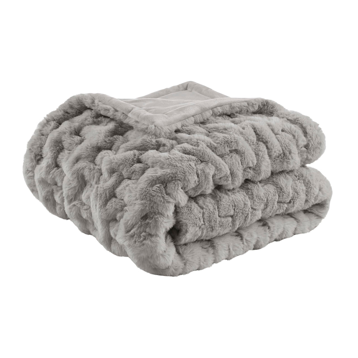 Madison Park throw front on sofa showing plush texture and stylish accent