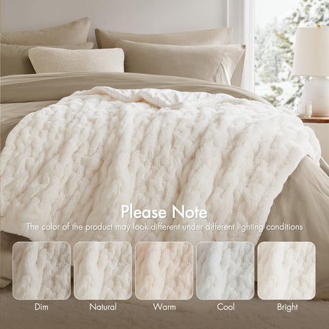 Madison Park throw next to a pillow showing 50x60 inch scale for fit