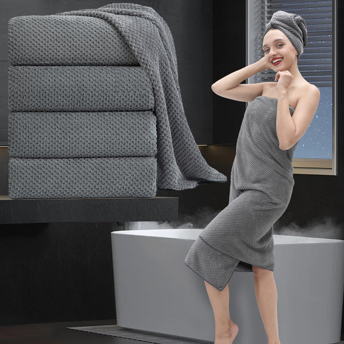 MAGGEA folded four-piece set front view shows plush towels and neat storage benefit