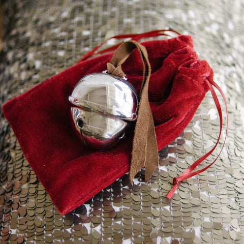 Magical Bells bell displayed on mantel in holiday scene, seasonal décor appeal