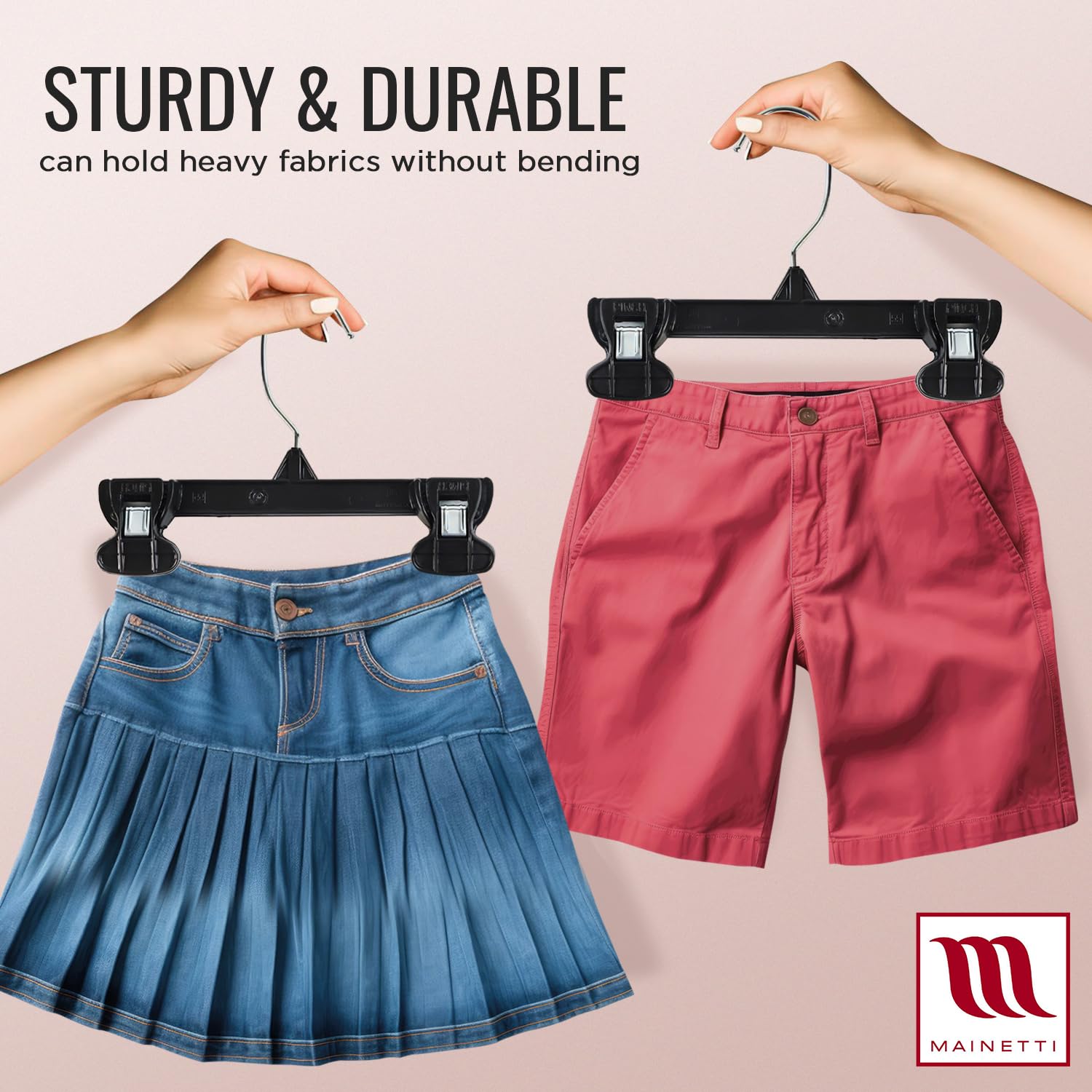 Mainetti hanger holding children's pants demonstrating reliable everyday support