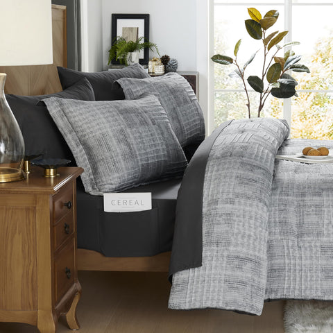MaiRêve styled king bed in room demonstrating cozy modern bedroom benefit