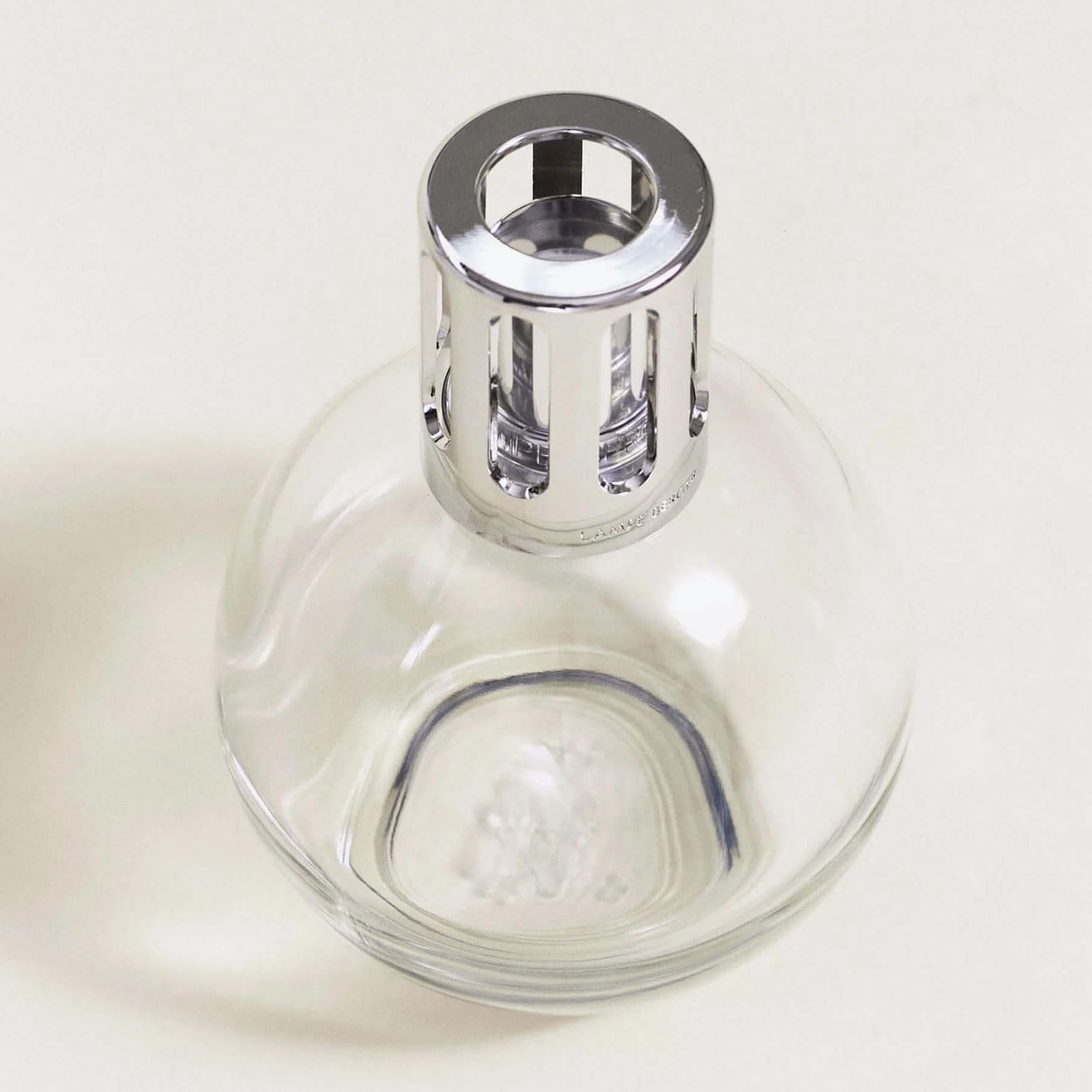 MAISON BERGER funnel and stopper accessories arranged for easy, spill-free refilling