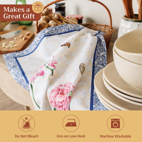 Maison d' Hermine stacked towels beside plate illustrating scale and capacity