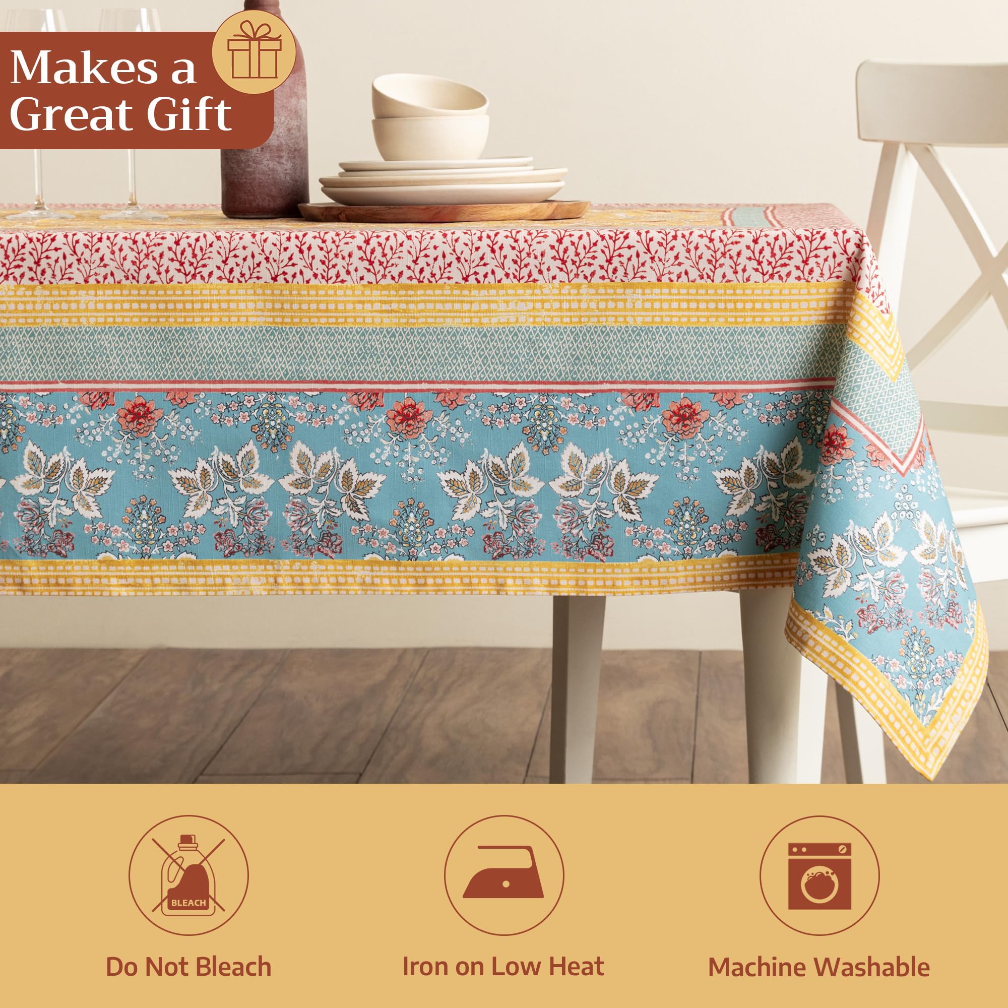 Maison d' Hermine tablecloth with plates and cutlery illustrating coordinated place setting ease