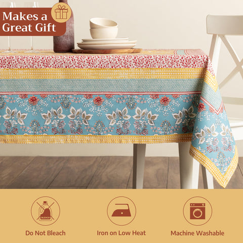 Maison d' Hermine tablecloth with plates and cutlery illustrating coordinated place setting ease