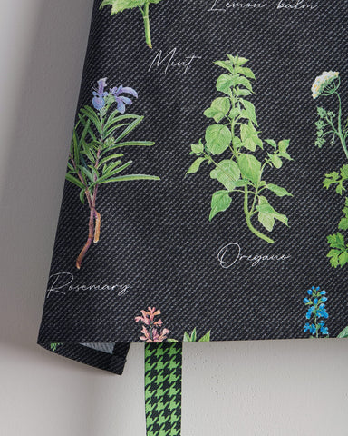 Maison d' Hermine apron pictured while gardening showing stain protection and mobility