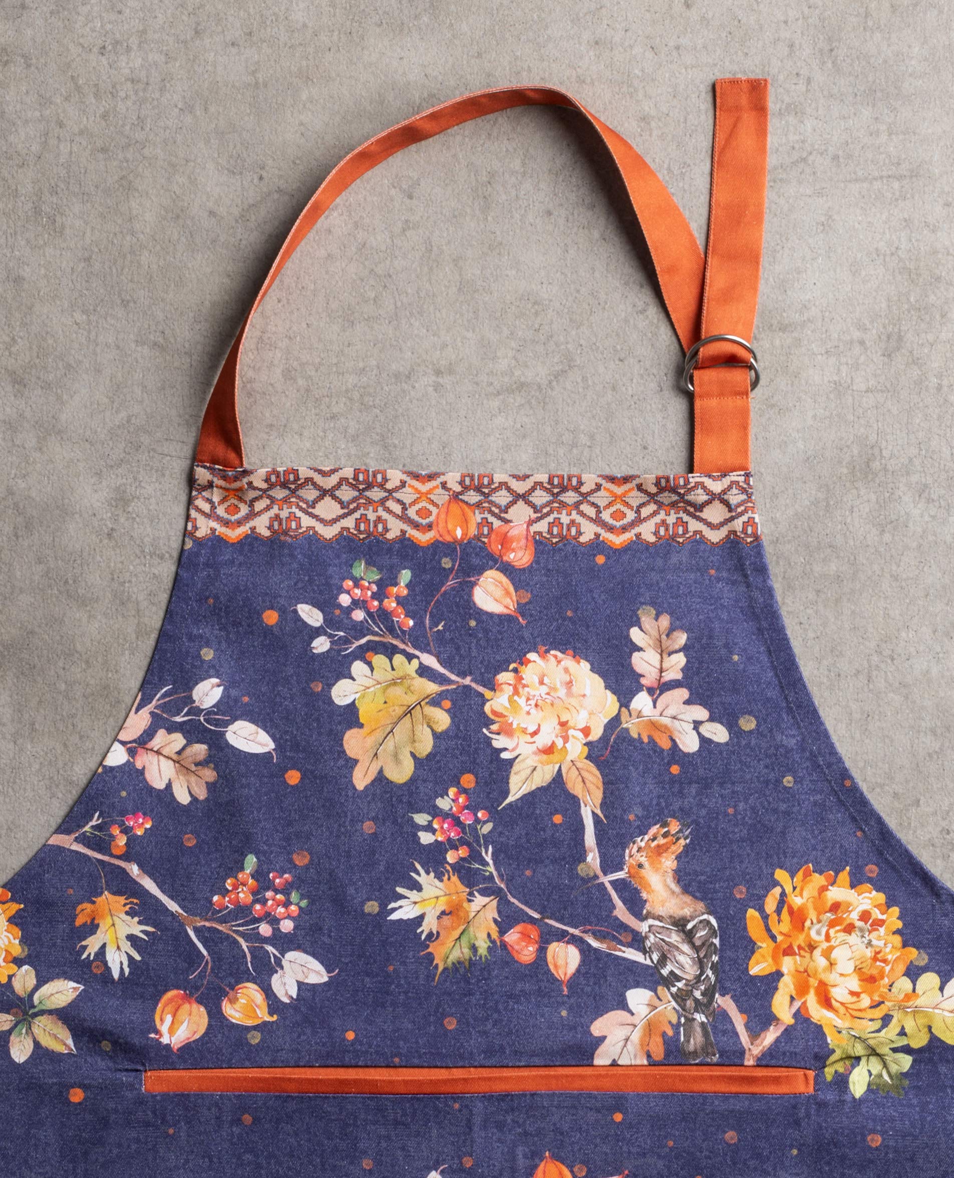Maison d' Hermine apron in use baking showing practical protection during active cooking