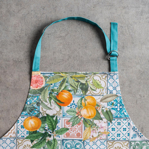 Maison d' Hermine apron in outdoor grilling scene showing practical use
