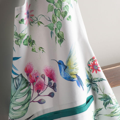 Maison d' Hermine apron on model for size comparison demonstrating generous coverage